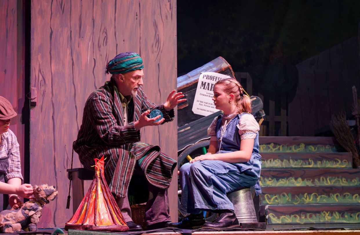 Violet Freann on stage with Professor Marvel in The Wizard of Oz